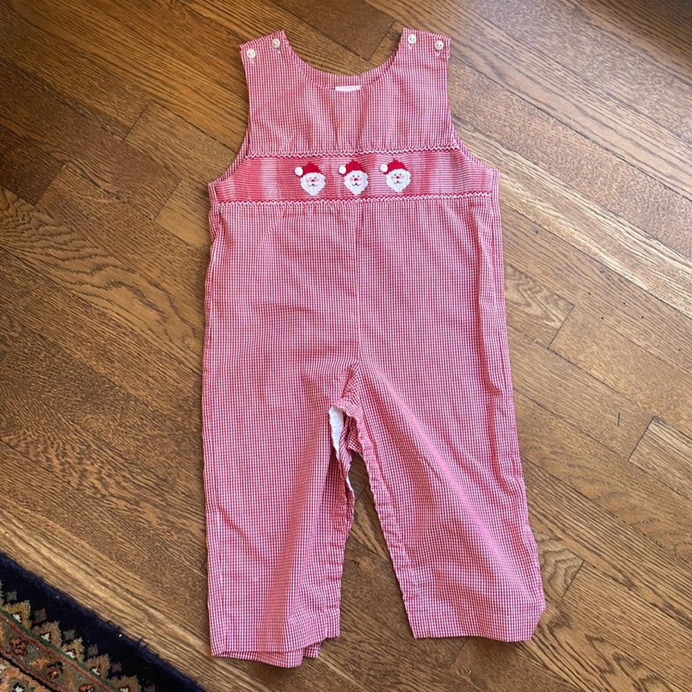 Like new Christmas smocked Santa Claus romper